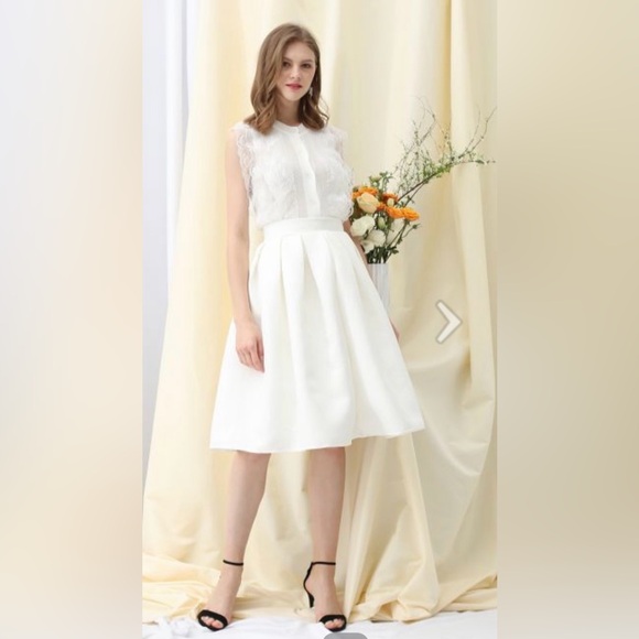 le chateau Dresses & Skirts - 2/$40 Jacquard Pleated with Pockets